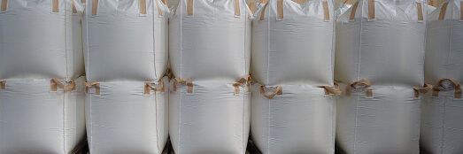 Stacking of bulk cargo in jumbo bags are store in warehouse